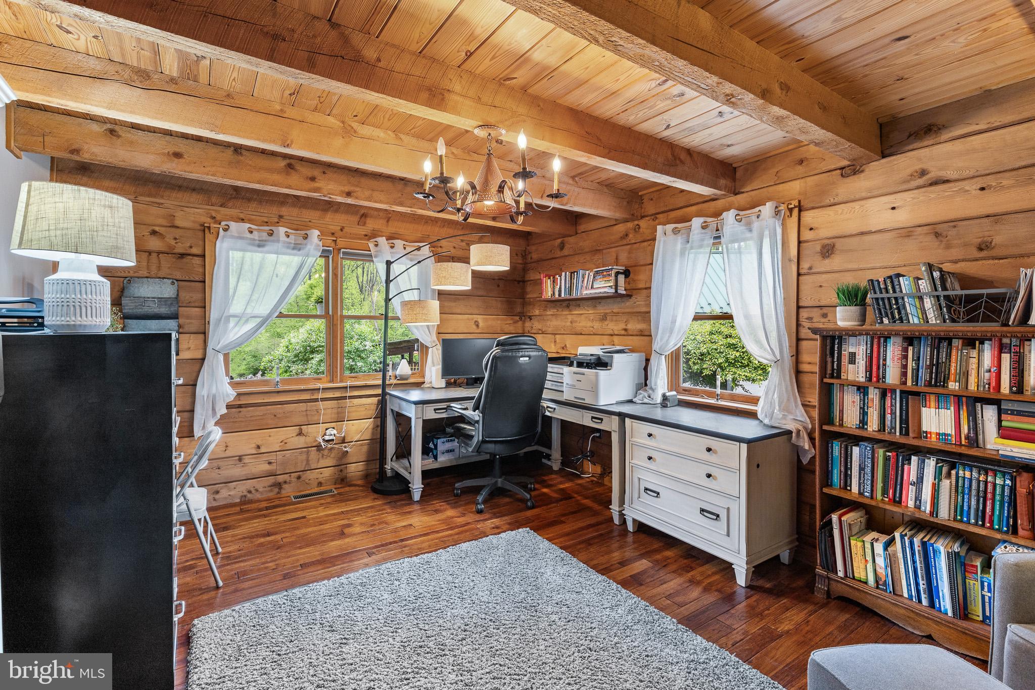 491 Sheep Hill Road Newmanstown, PA 17073 - Photo 17 of 30 a room with furniture and a book shelf