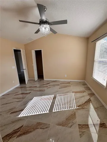 a en suite bathroom with a toilet sink and mirror