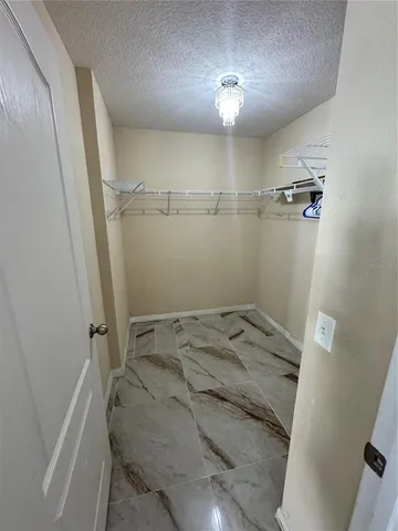 a bathroom with a sink and shower