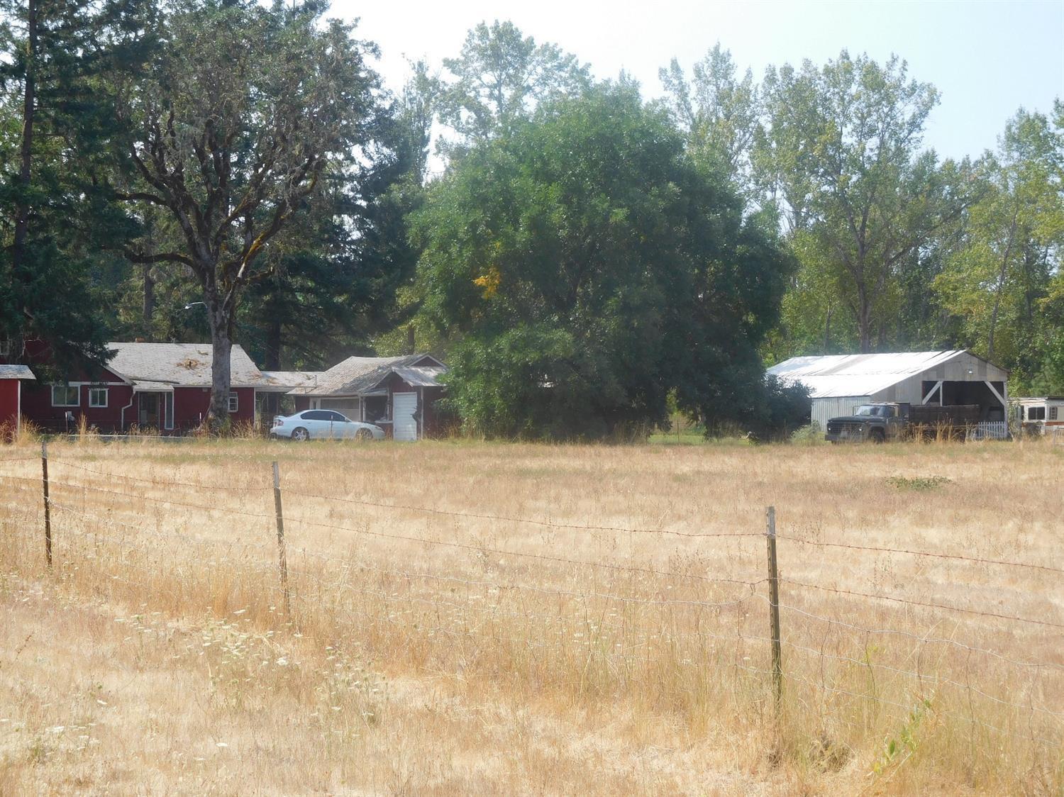 2180 Dick George Road Cave Junction, OR 97523 - Photo 7 of 34 Closer view of improvements, including t
