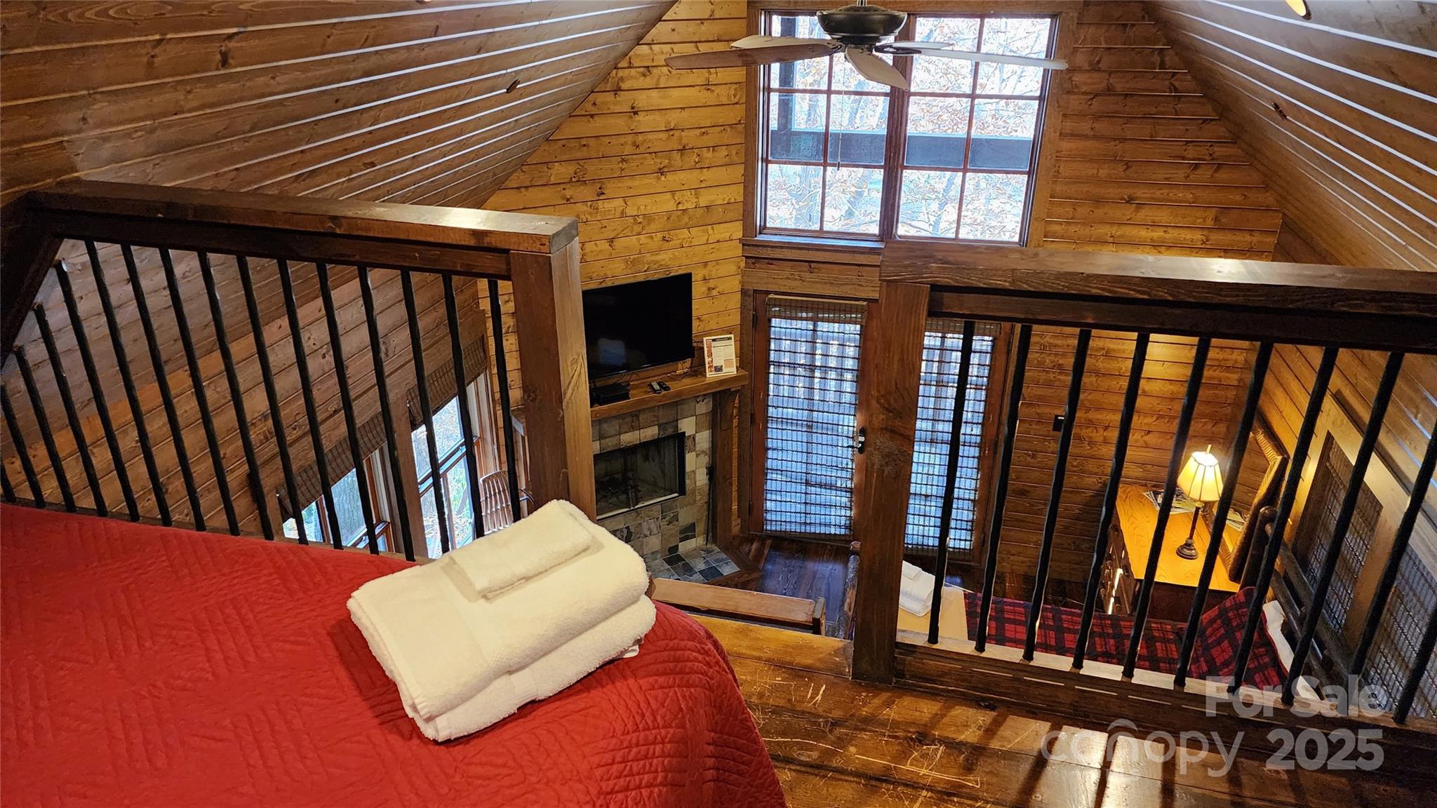 5 Chaucer Road Black Mountain, NC 28711 - Photo 15 of 48 a living room with couches bookshelf and a large window