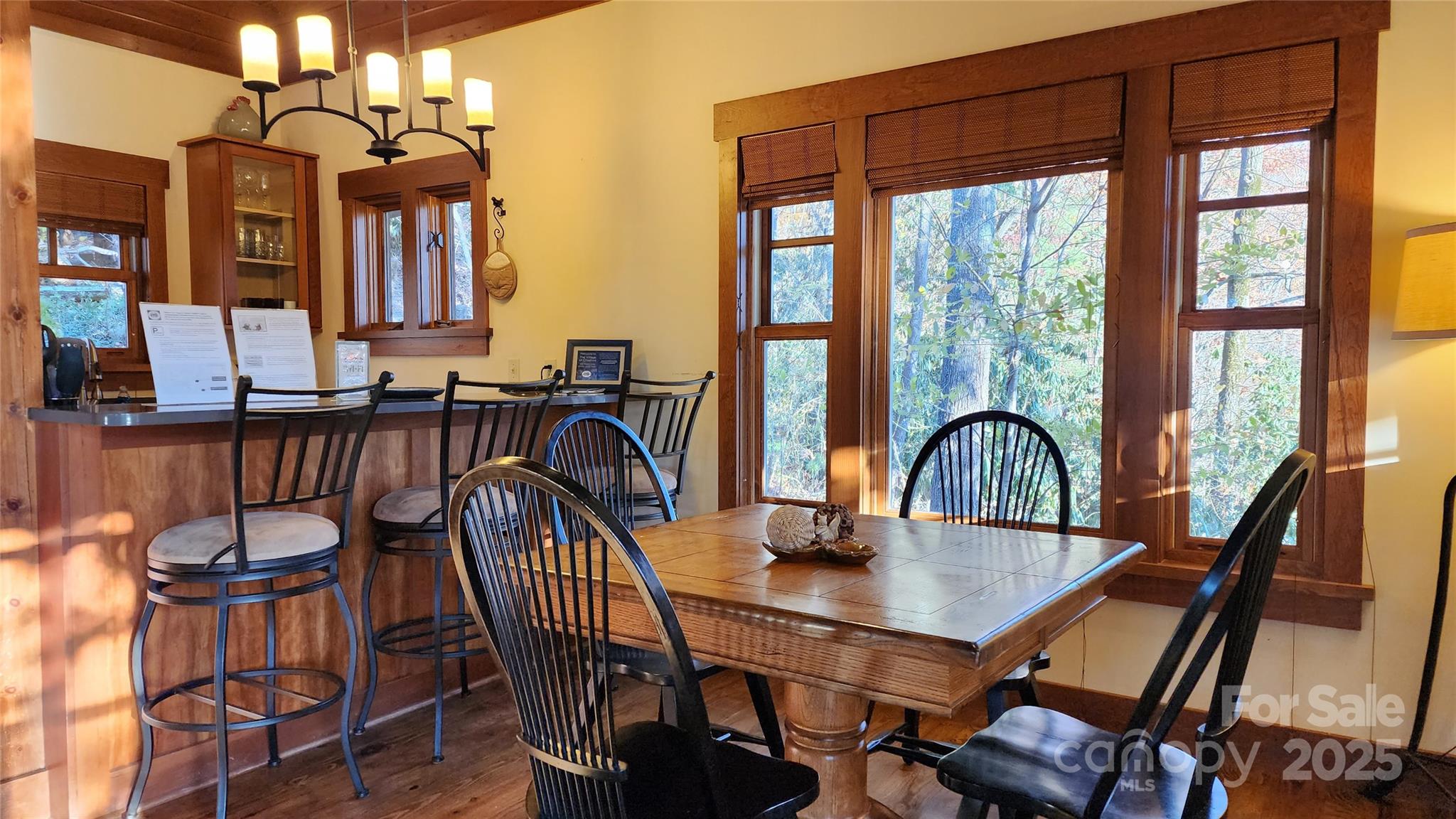 5 Chaucer Road Black Mountain, NC 28711 - Photo 26 of 48 a view of a dining room with furniture window and outside view
