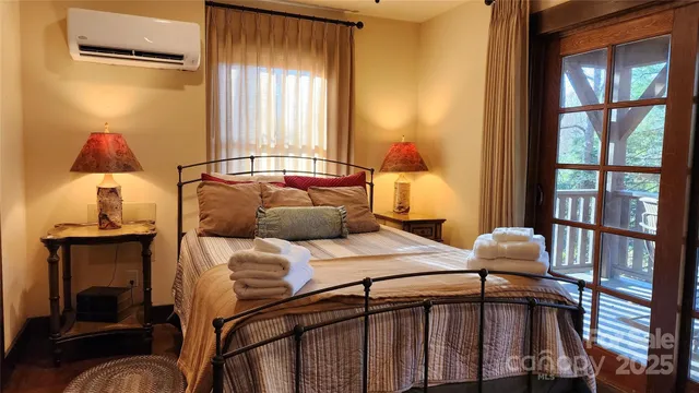 a bedroom with furniture and a fireplace