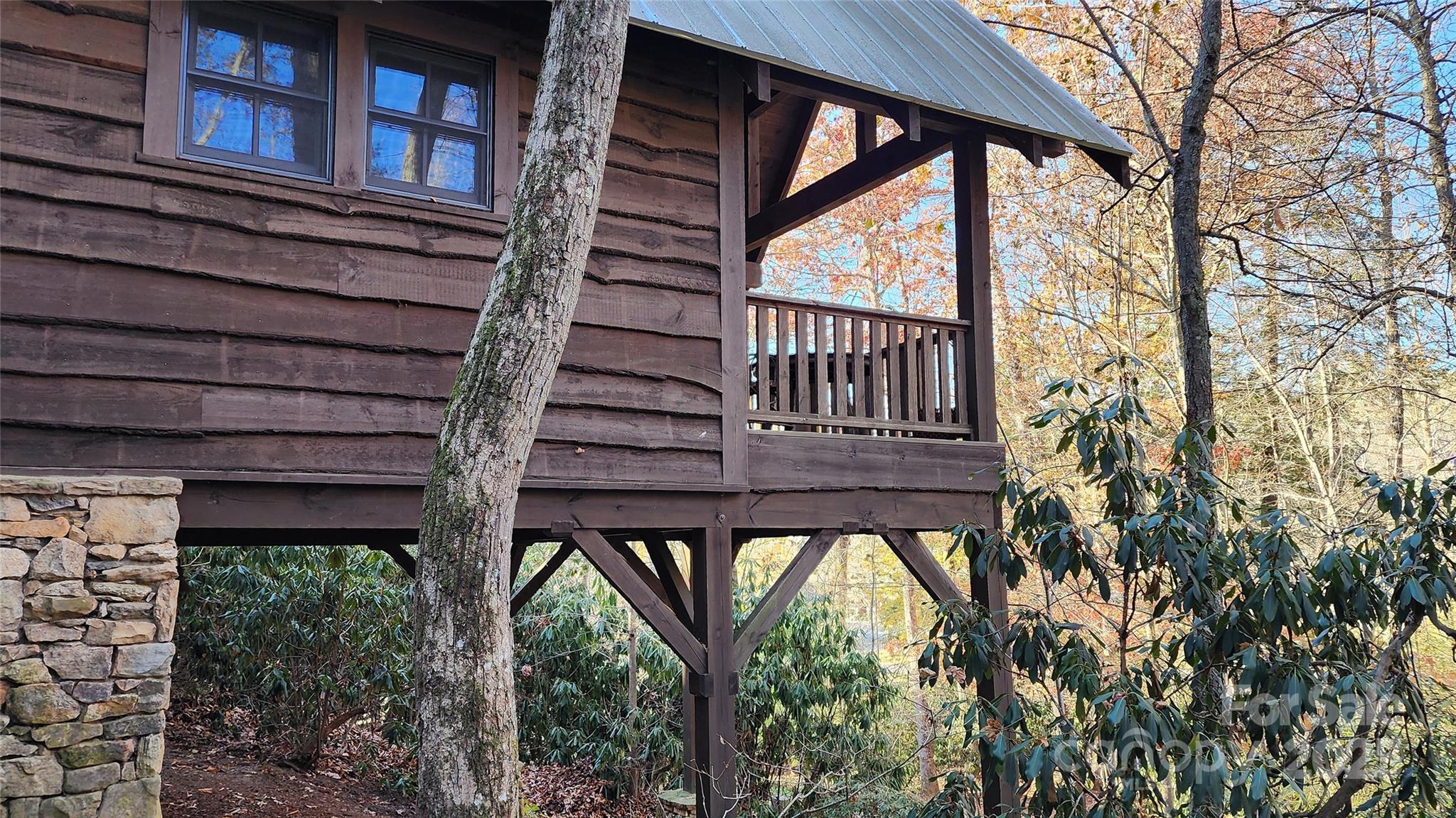 5 Chaucer Road Black Mountain, NC 28711 - Photo 41 of 48 a view of a house with a window and wooden fence