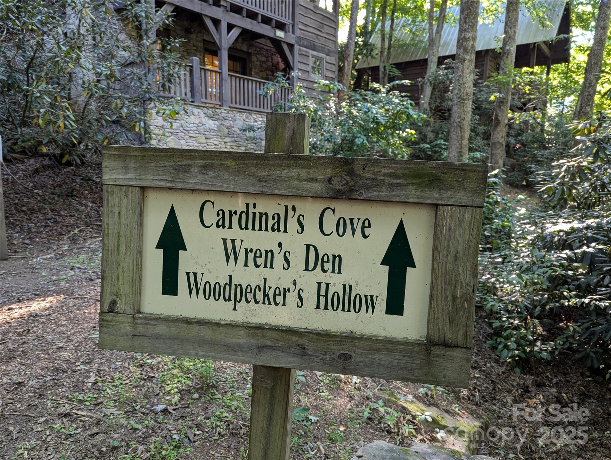 5 Chaucer Road Black Mountain, NC 28711 - Photo 6 of 48 a sign broad on the side of the road