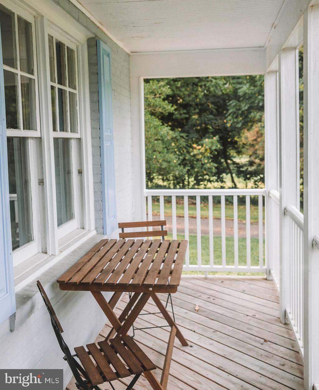 12242 Harpers Ferry Road Purcellville, VA 20132 - Photo 11 of 49 a view of a living room and wooden floor