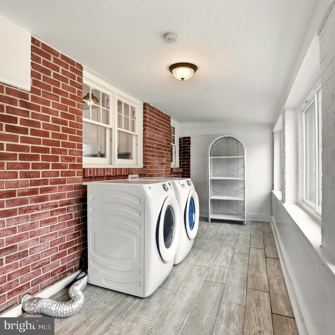 12242 Harpers Ferry Road Purcellville, VA 20132 - Photo 34 of 49 a utility room with dryer and washer