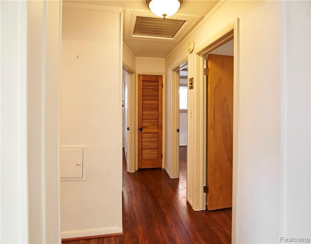 3504 West Webster Road Royal Oak, MI 48073 - Photo 9 of 44 Hallway to Bath & Bedrooms with View of Attic Fan
