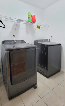 a utility room with a washer and dryer