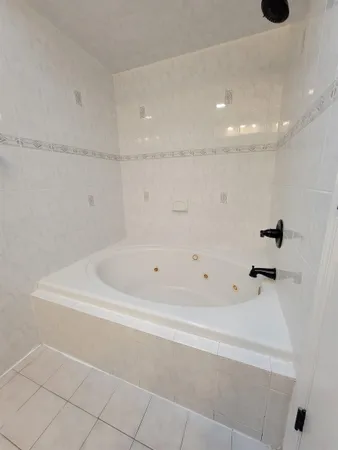 a bathroom with a bathtub