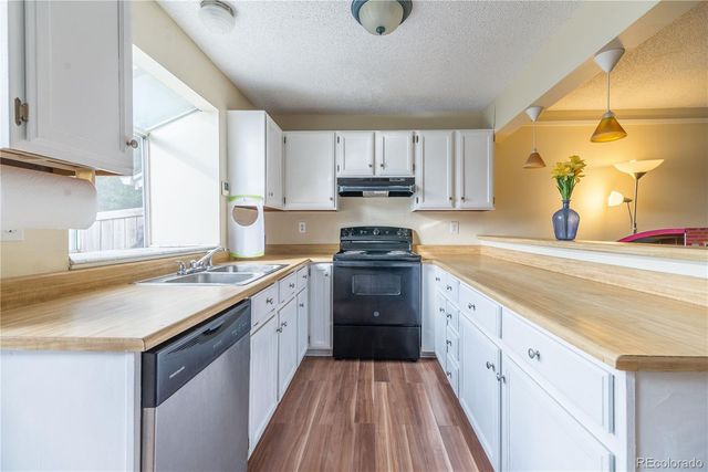 $305,000 | 17105 East Chenango Avenue, Unit A, Aurora, CO 80015