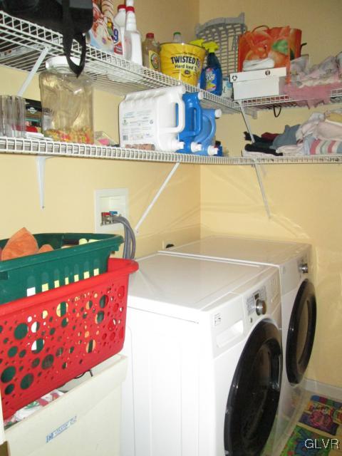 420 Ridge Lane Nazareth, PA 18064 - Photo 17 of 39 1st floor laundry room with storage shelves