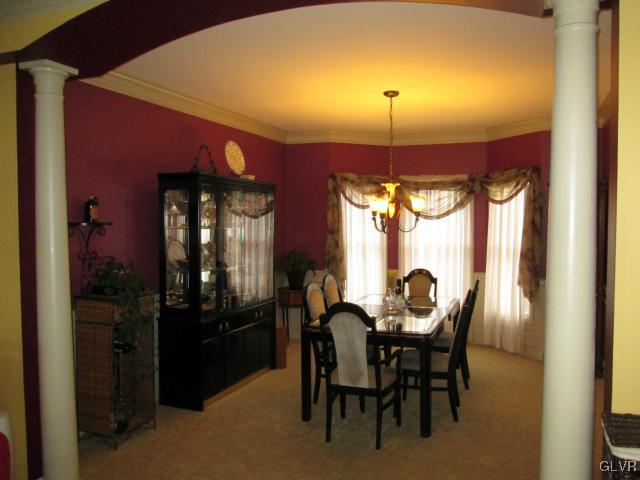 420 Ridge Lane Nazareth, PA 18064 - Photo 7 of 39 Roman columns and arch frame the formal dining roo