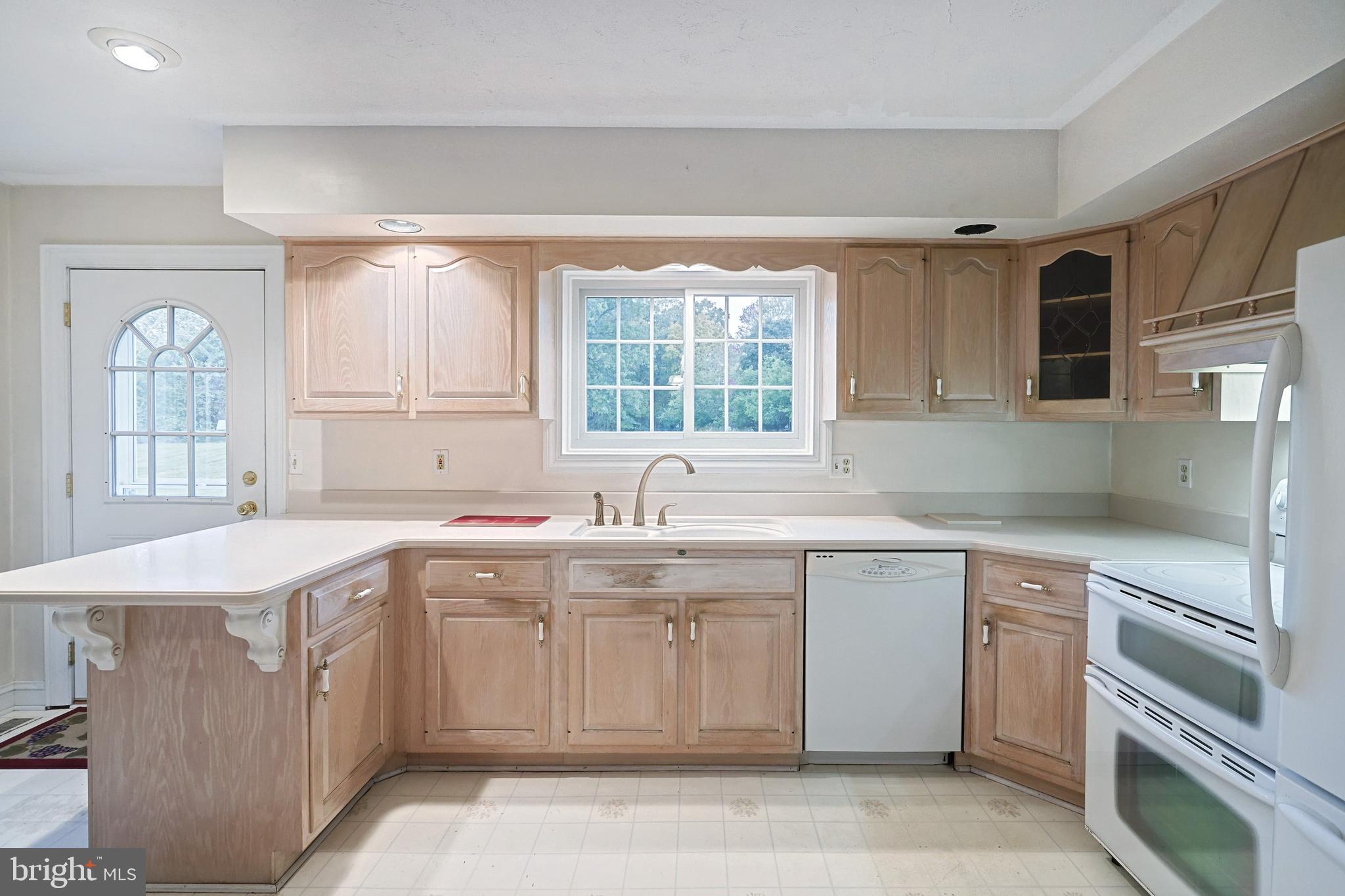 302 Pinetown Road Hanover, PA 17331 - Photo 20 of 55 a kitchen with a sink stove and cabinets