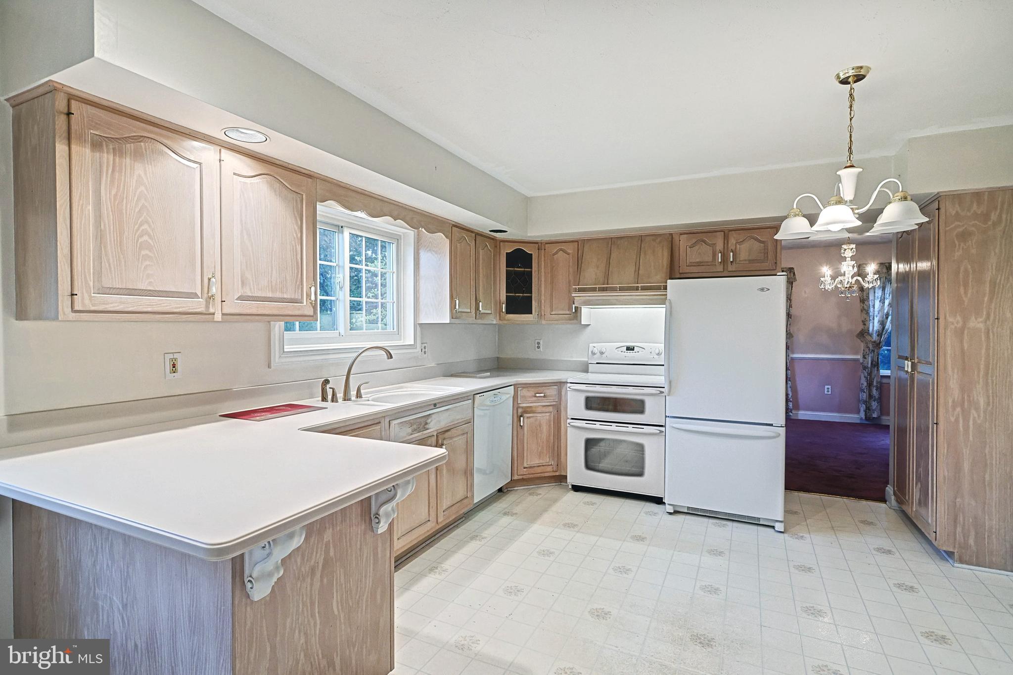 302 Pinetown Road Hanover, PA 17331 - Photo 21 of 55 a kitchen that has a sink a stove and a refrigerator