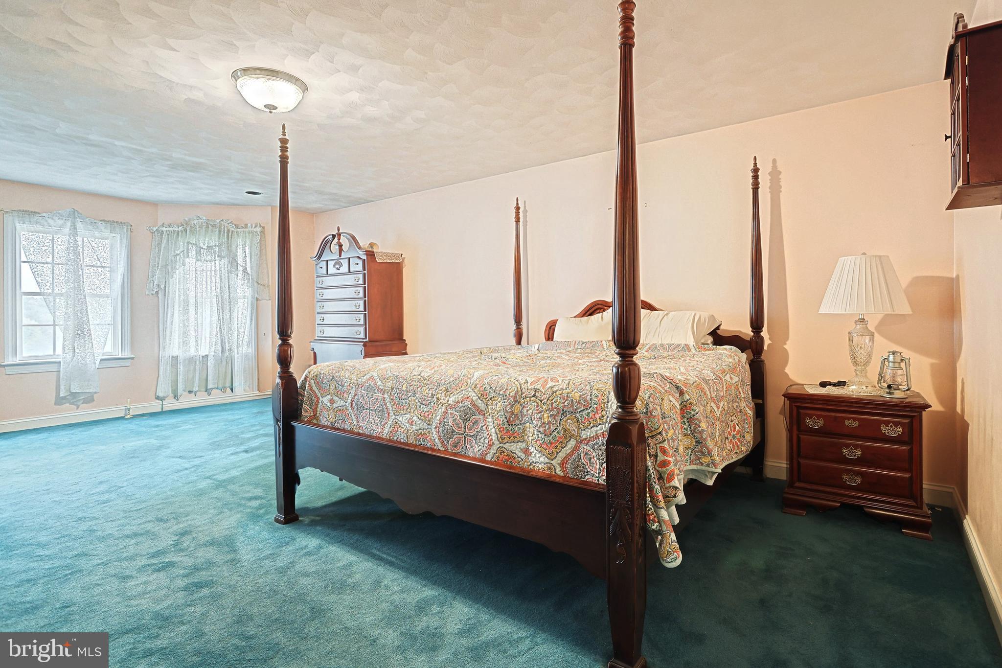 302 Pinetown Road Hanover, PA 17331 - Photo 28 of 55 a bed sitting in a room next to a window