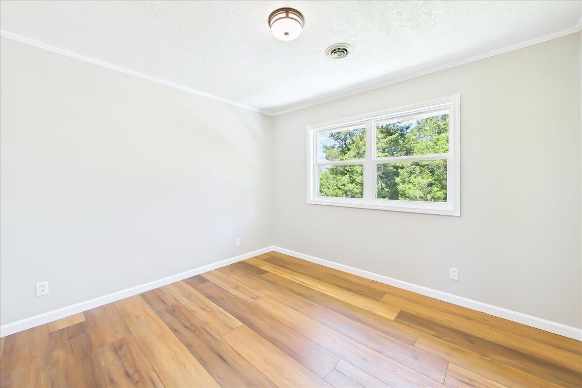 858 Main Street Decatur, TN 37322 - Photo 29 of 65 an empty room with a window