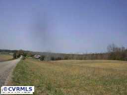 10011 Tribble Road Beaverdam, VA 23015 - Photo 6 of 8 a view of lake and mountain
