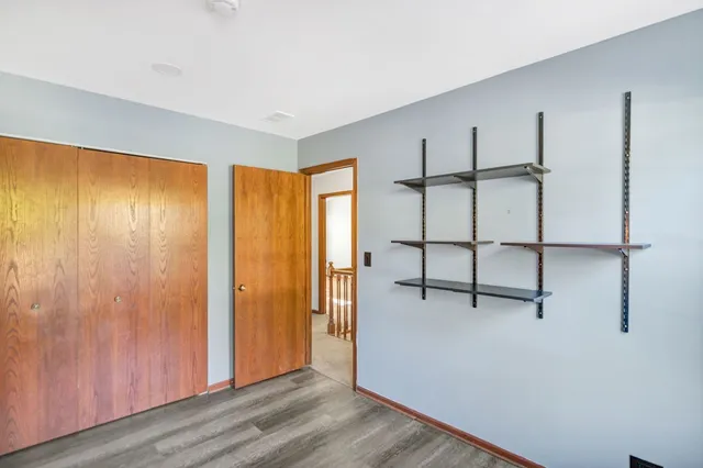 a view of entryway with wooden floor