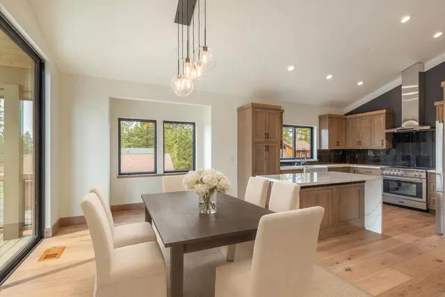 a view of a dining room with furniture window and outside view