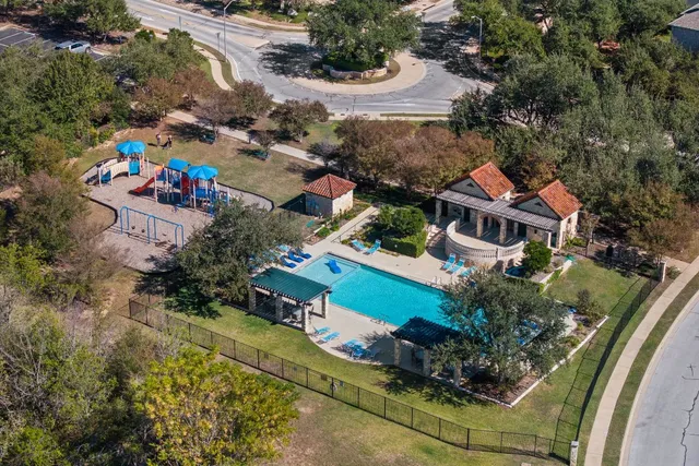 an aerial view of a house with a garden