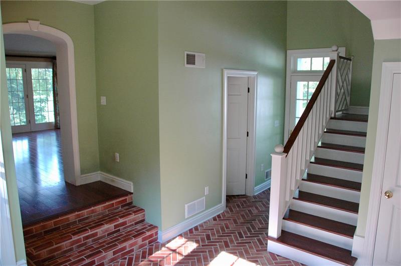2 Farmhill Road Sewickley, PA 15143 - Photo 14 of 25 New Mudroom with brick flooring, full bath and multiple closets. French door to driveway area, access to garage is behind photographer.
