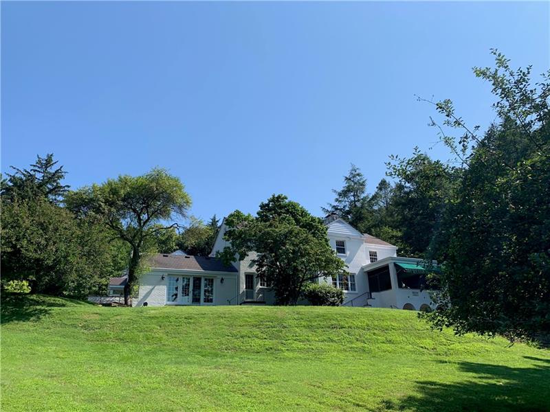 2 Farmhill Road Sewickley, PA 15143 - Photo 24 of 25 Back of house that overlooks expansive yard. There are few different flat areas for playing.