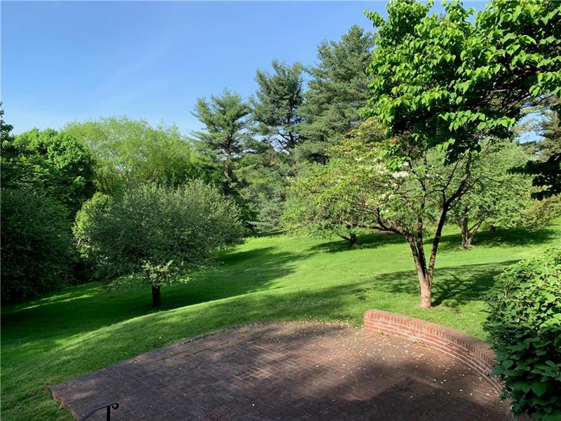 2 Farmhill Road Sewickley, PA 15143 - Photo 7 of 25 View from Covered Porch off of Living and Dining Rooms feels like an outdoor room in any season. There are steps that lead down to brick terrace and yard.