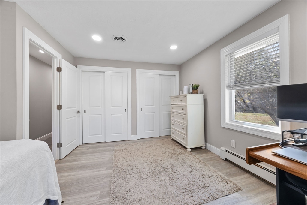 124 Lake Street Bellingham, MA 02019 - Photo 18 of 39 a view of an empty room with a window