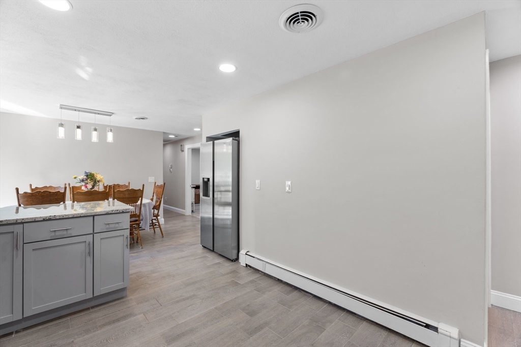 124 Lake Street Bellingham, MA 02019 - Photo 7 of 39 a view of a kitchen with a sink