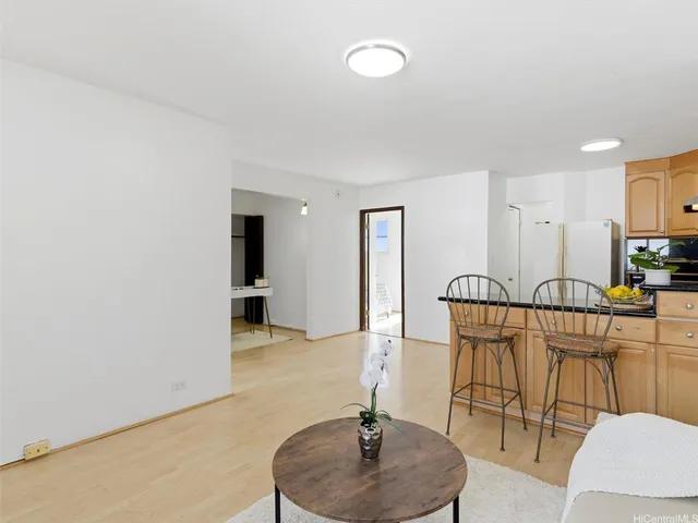 a living room with furniture and a table
