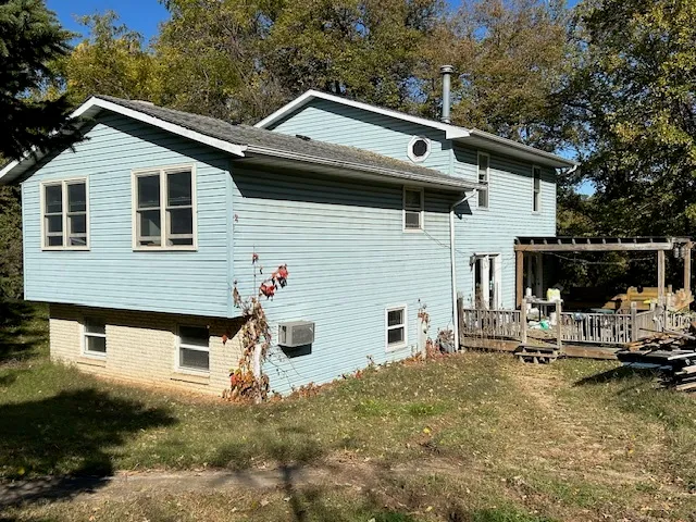 a backyard of a house with seating space