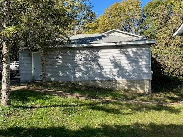 a backyard of a house with green space