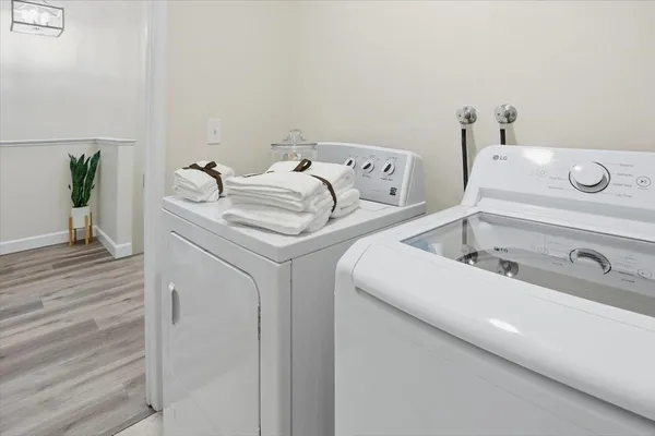 a utility room with dryer and washer