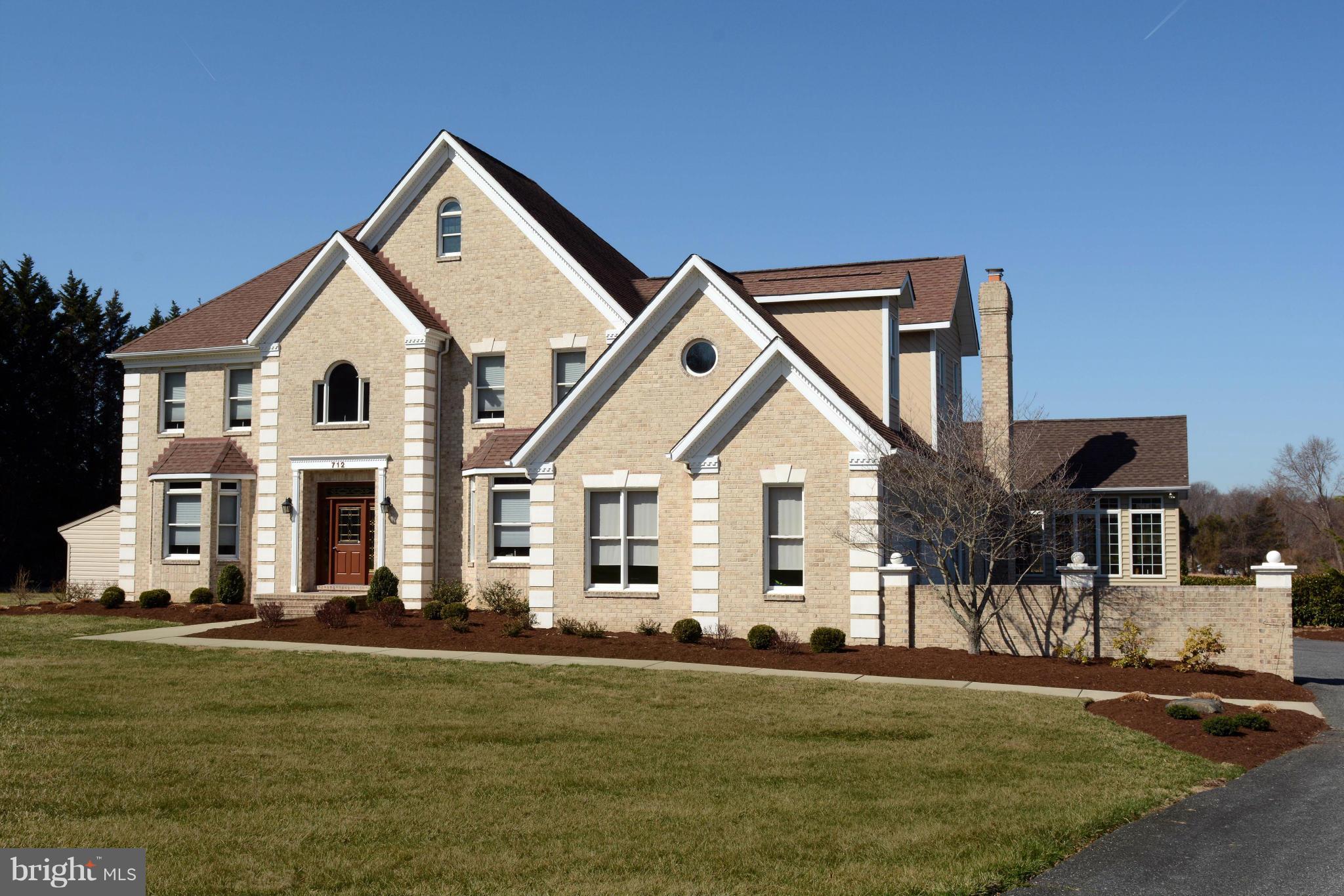 712 Connolly Farms Road Fallston, MD 21047 - Photo 30 of 30 a front view of a house with a garden