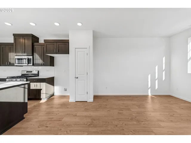 a view of empty room with windows