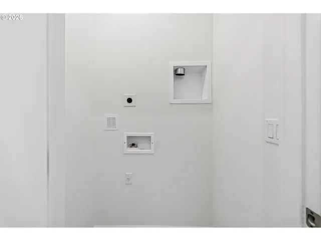 a kitchen that has a microwave and a stove