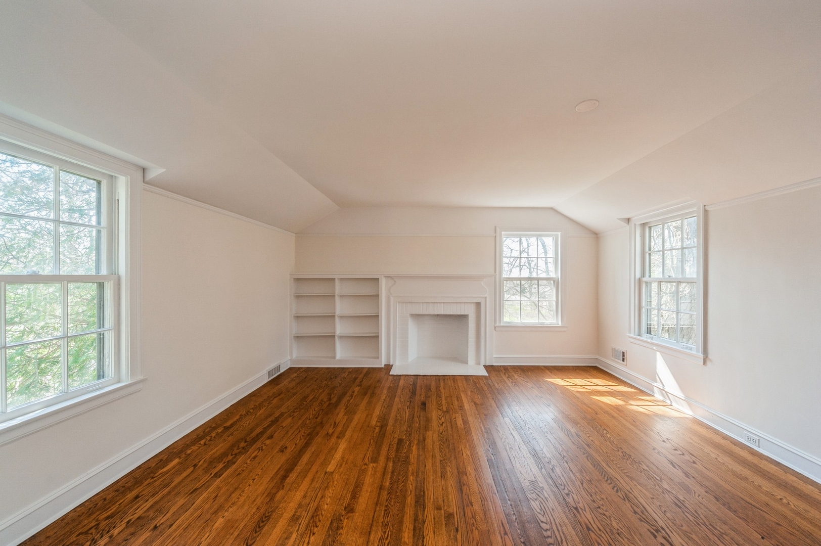872 Green Bay Road Highland Park, IL 60035 - Photo 12 of 30 an empty room with wooden floor and windows