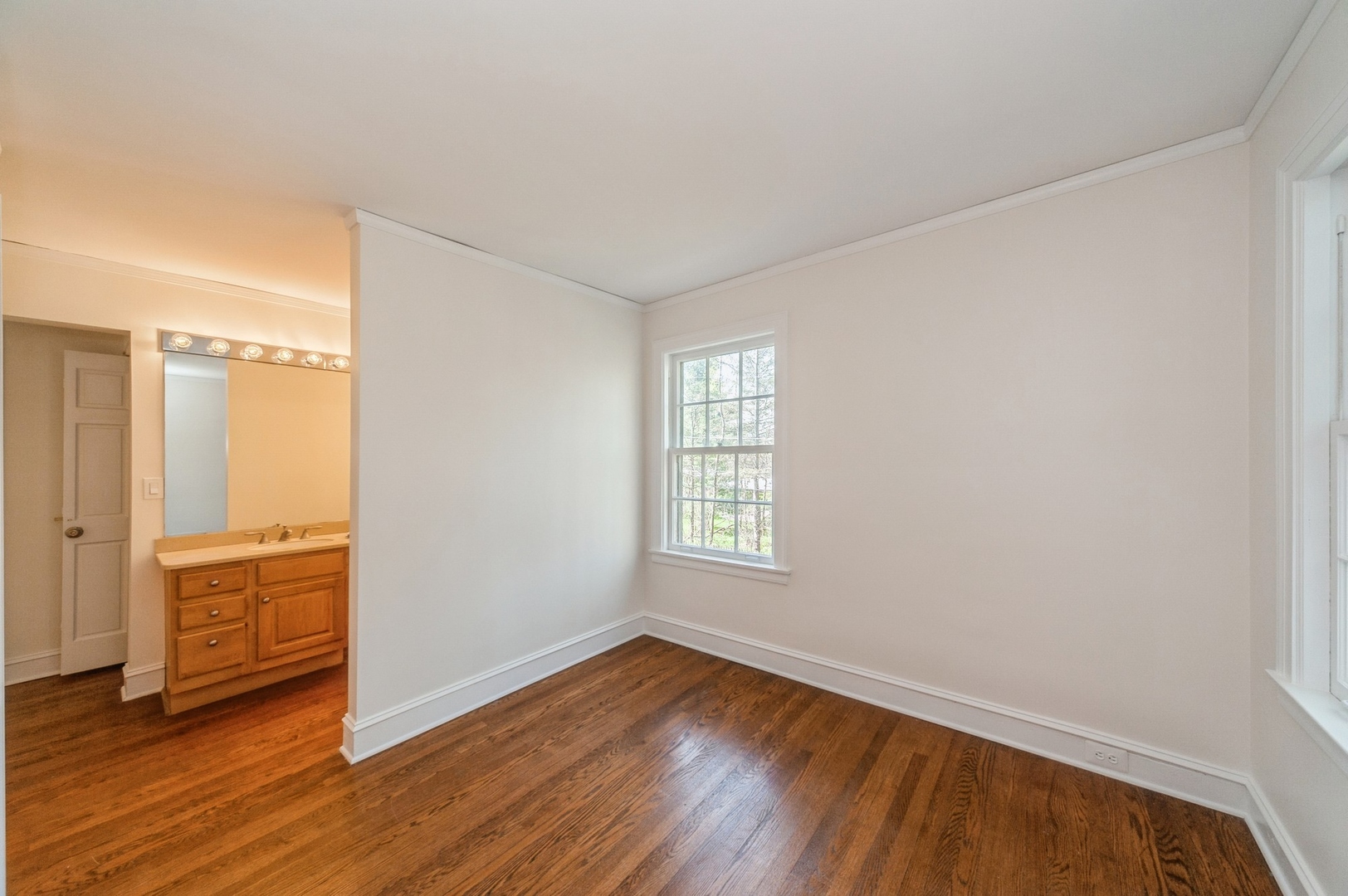 872 Green Bay Road Highland Park, IL 60035 - Photo 14 of 30 an empty room with wooden floor and windows