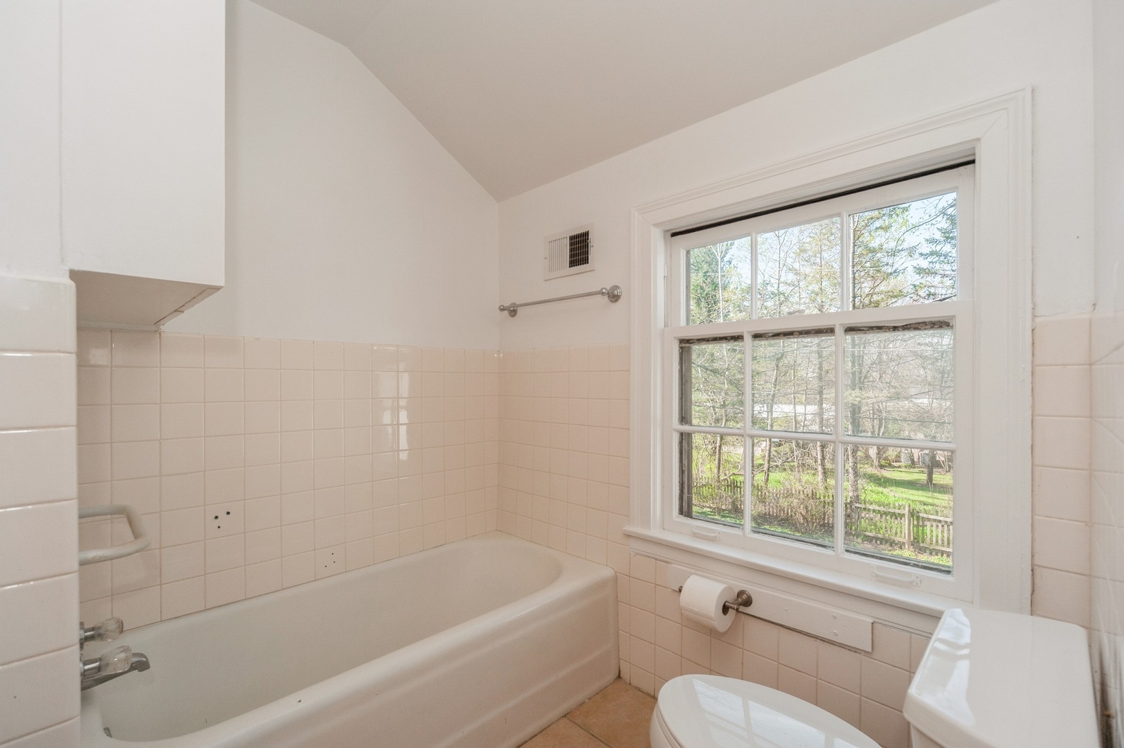 872 Green Bay Road Highland Park, IL 60035 - Photo 16 of 30 a bathroom with a sink a window and a toilet