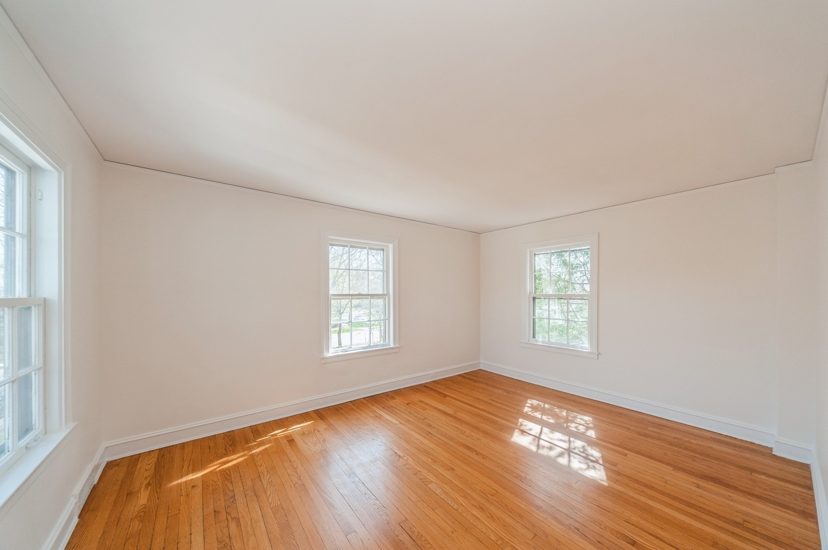 872 Green Bay Road Highland Park, IL 60035 - Photo 17 of 30 a view of a livingroom with wooden floor and window