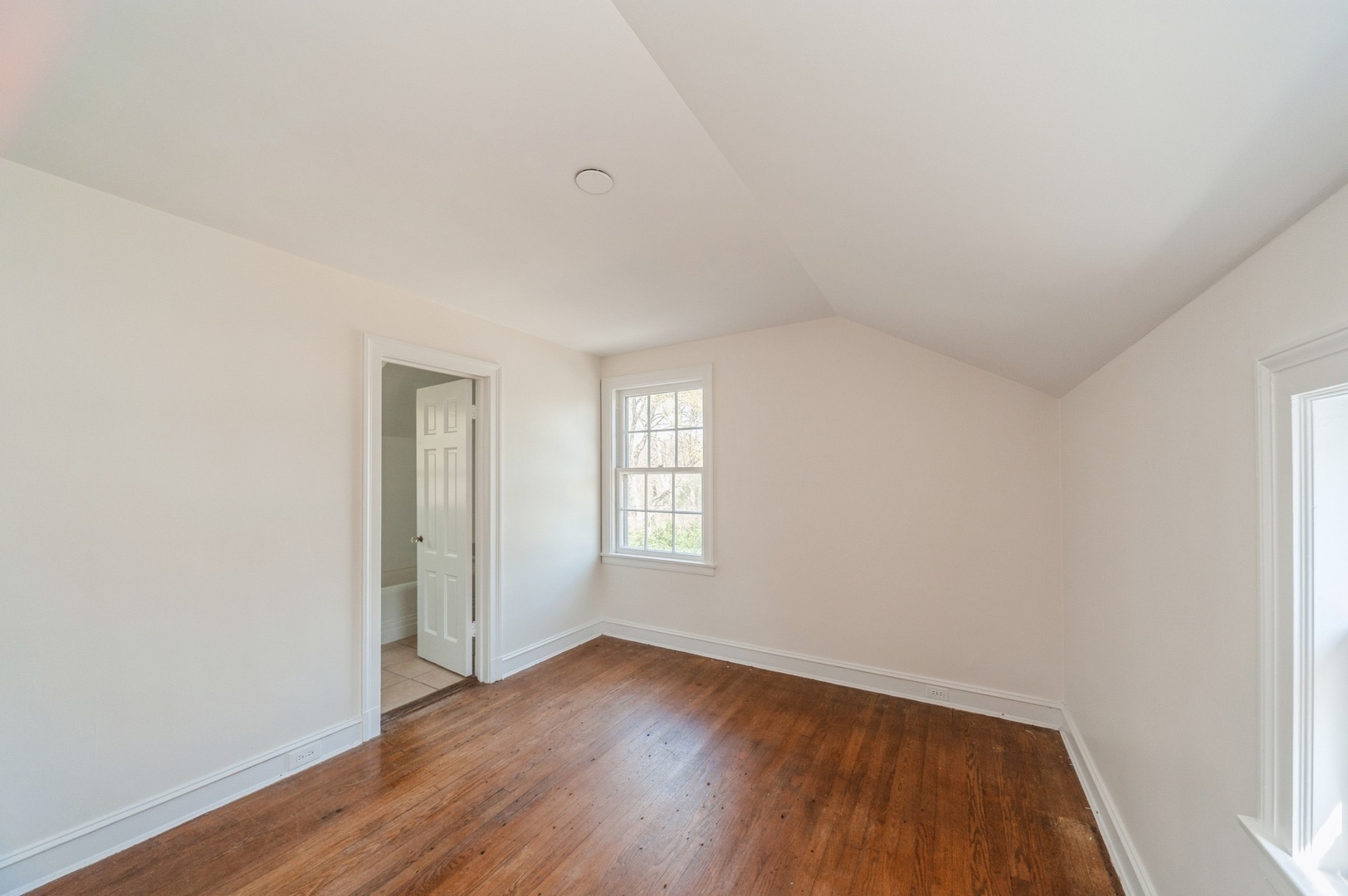 872 Green Bay Road Highland Park, IL 60035 - Photo 18 of 30 an empty room with wooden floor and window