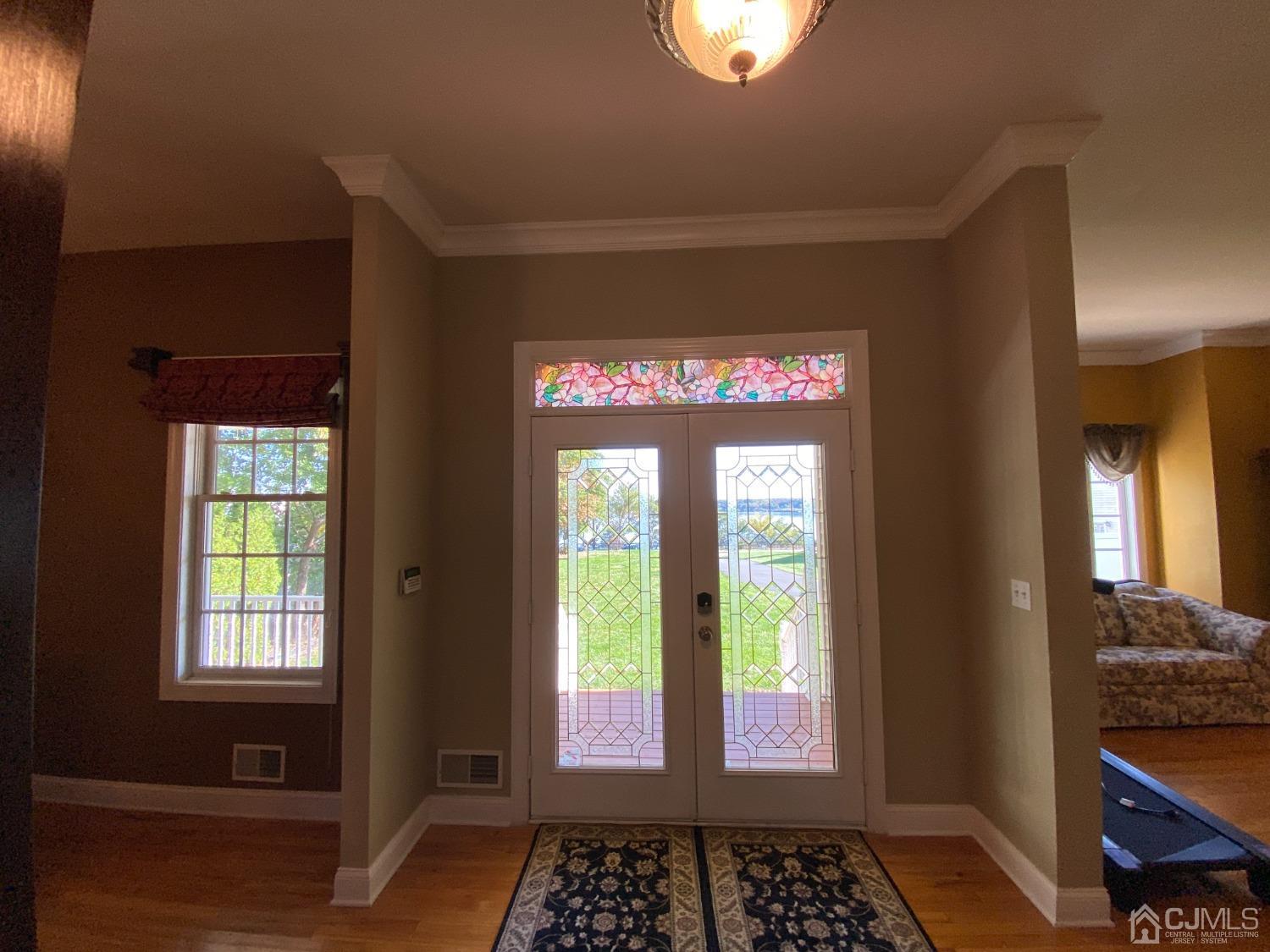 418 Cliff Road Sewaren, NJ 07077 - Photo 14 of 63 a view of a entryway door with a couch