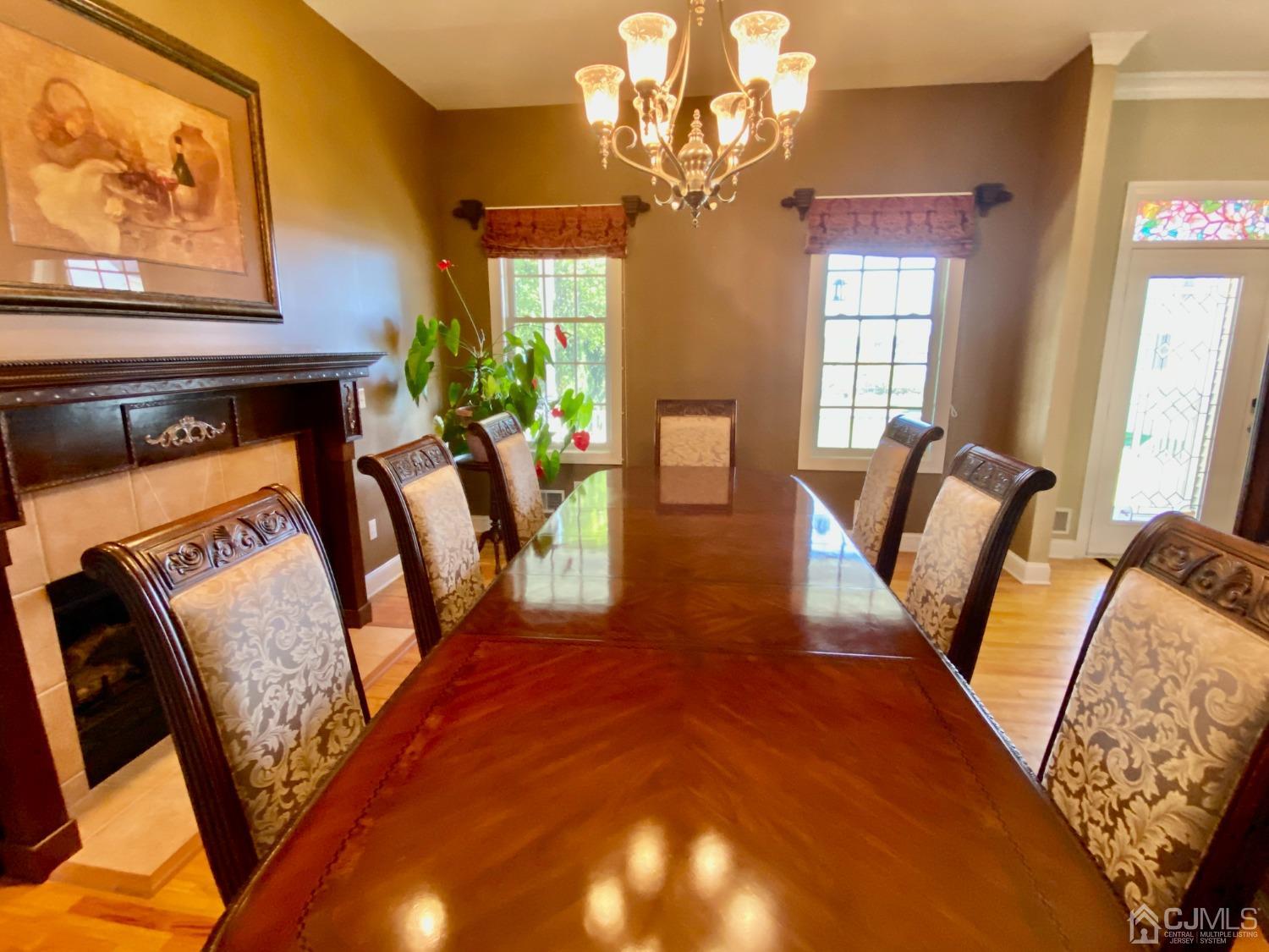 418 Cliff Road Sewaren, NJ 07077 - Photo 21 of 63 a view of a livingroom with furniture window and wooden floor