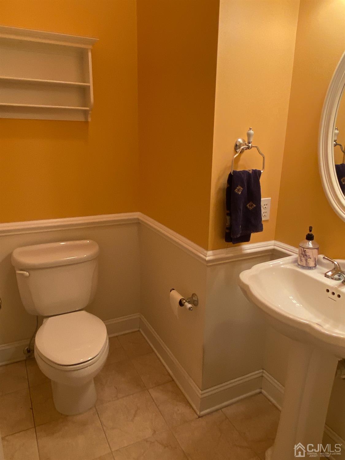 418 Cliff Road Sewaren, NJ 07077 - Photo 28 of 63 a bathroom with a sink and a toilet