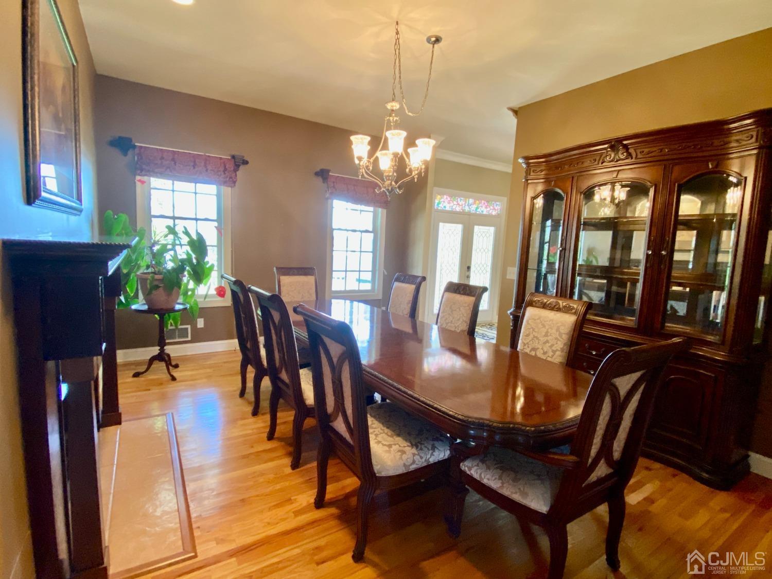 418 Cliff Road Sewaren, NJ 07077 - Photo 3 of 63 a view of a dining room with furniture and window