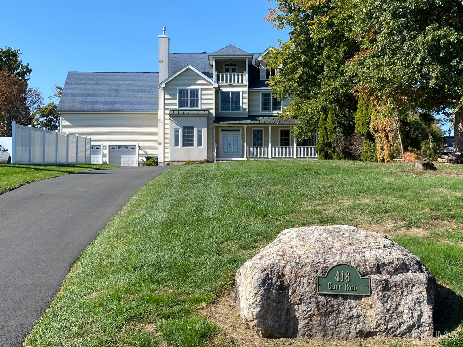 418 Cliff Road Sewaren, NJ 07077 - Photo 9 of 63 a view of a house with a yard
