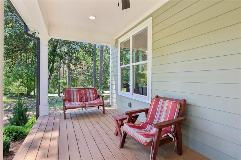 250 Stagecoach Road Oxford, GA 30054 - Photo 12 of 76 a view of a two chairs in the balcony