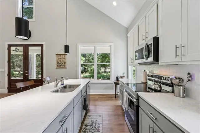 a bedroom with a bed and a couch