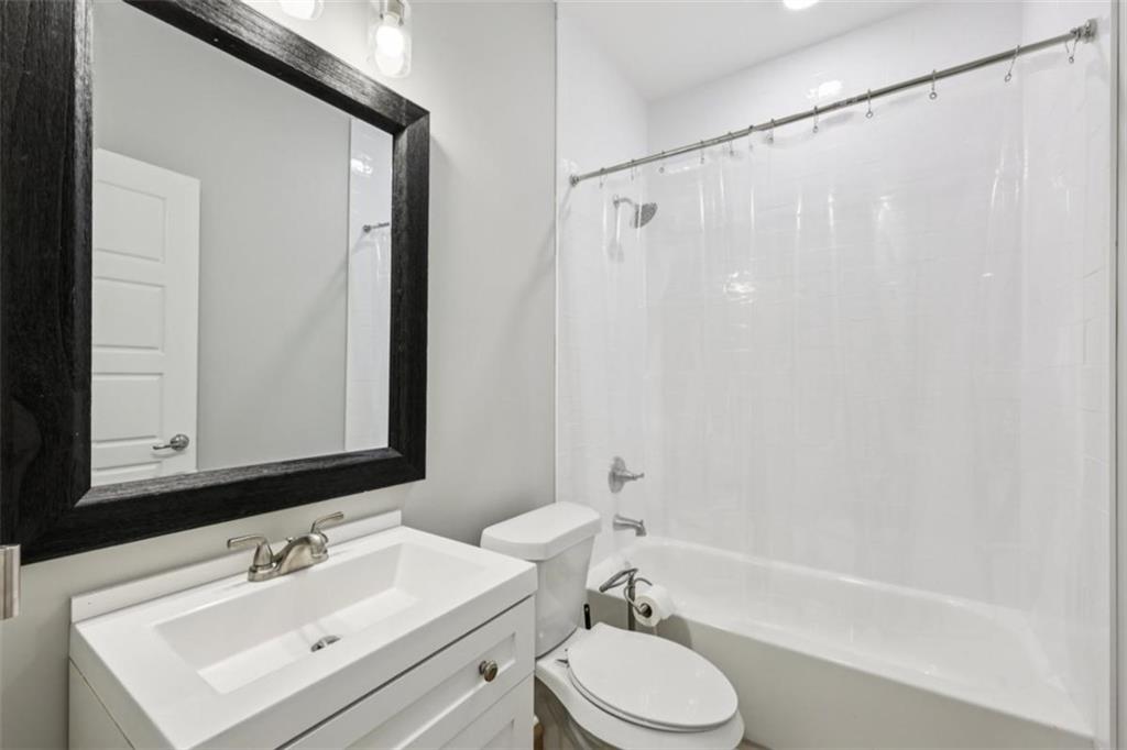 250 Stagecoach Road Oxford, GA 30054 - Photo 28 of 76 a bathroom with a sink a toilet and shower